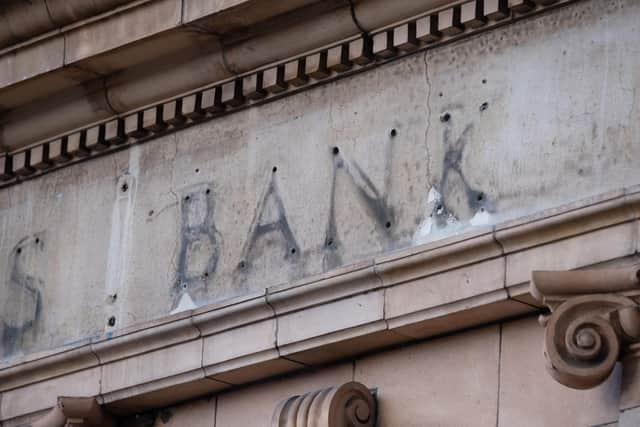 a sign over a former bank, photo by Martin Keene PA Images