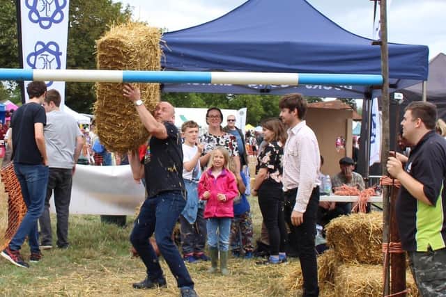Hay bale tossing at the Winslow Show