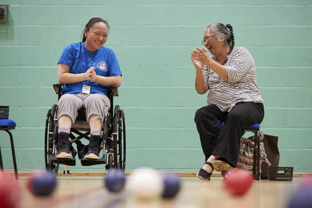 The games are an opportunity for people with spinal injuries to share their stories and support each other. Image: Roger Bool