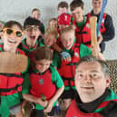 Scouts preparing to conquer the Thames on a thrilling rafting expedition