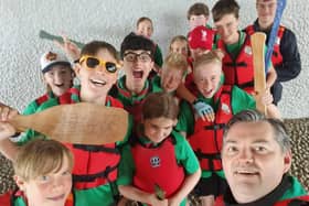 Scouts preparing to conquer the Thames on a thrilling rafting expedition