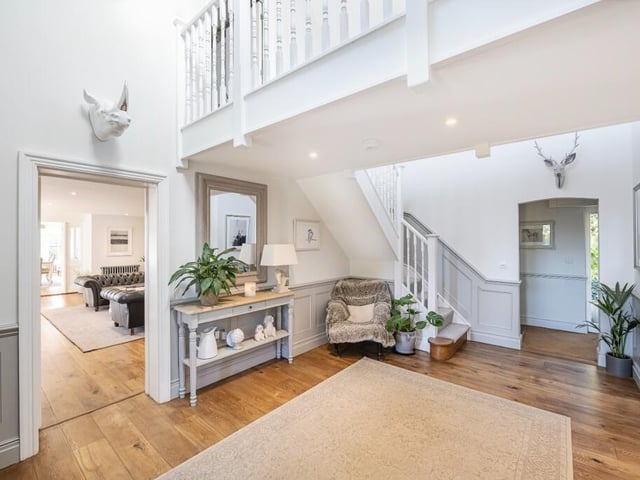The entrance hall to the property, which the estate agents say ‘sets the tone’ for the rest of Red Roofs