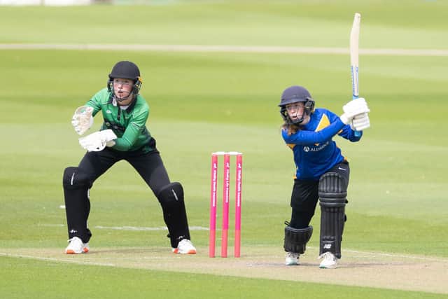 Bucks' Tilly Fellows in action behind the stumps