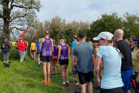 Runners line up for the start