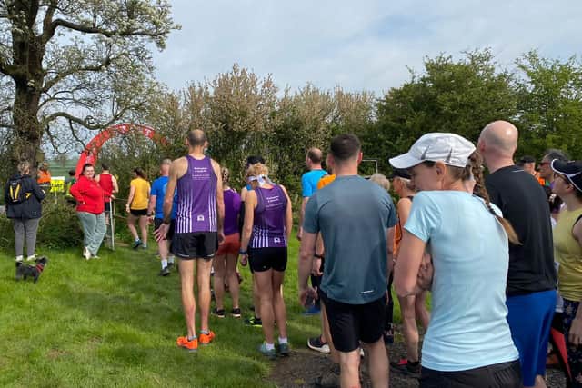 Runners line up for the start