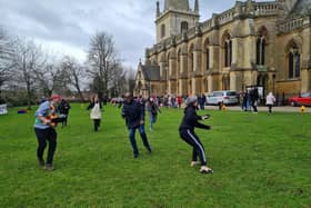 Adults race at last year's Buckingham Pancake Races