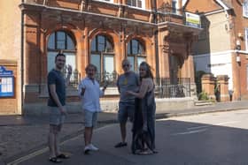 Jeff Crisp, second from left, outside the former TSB bank building with Winslow traders Adam Schofield from Mood and David McLaren and Chloe Troutt from Verdigris Antiques and Interiors