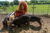 Yoga teacher Natasha at Kew Little Pigs - Animal News Agency