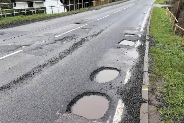 Some of the potholes on the main road