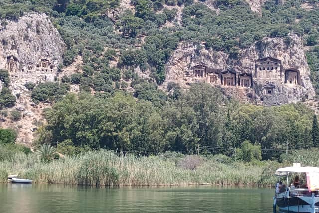The Tombs of the Kings carved into the cliff face on the Dalyan River, Turkey