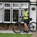 Angie returning home from a muddy training ride