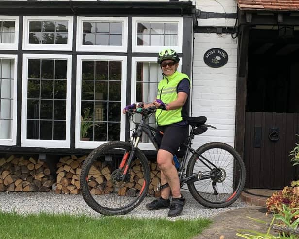 Angie returning home from a muddy training ride