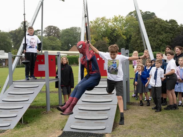 Spider-man trying out the new zip wire