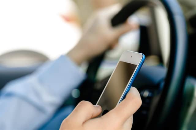 People using a mobile phone while driving face a £200 fine and six penalty points on their licence.