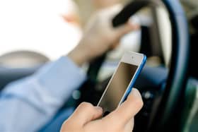 People using a mobile phone while driving face a £200 fine and six penalty points on their licence.