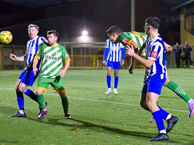 Justin Dass heads the winning goal at Ware. Photo: Mike Snell.