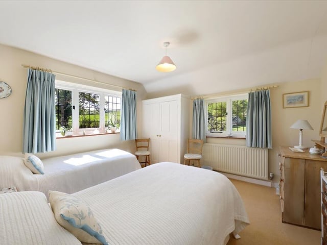 One of the four double aspect (twin bedrooms) all of which are presented in good decorate order.