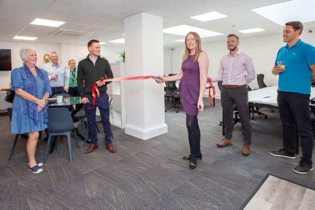 Katie Knott, centre manager on ribbon-cutting duty at Regent House