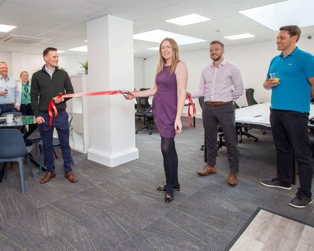 Katie Knott, centre manager on ribbon-cutting duty at Regent House