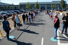 Thousands of shoppers were seen queuing for reopened shops in England