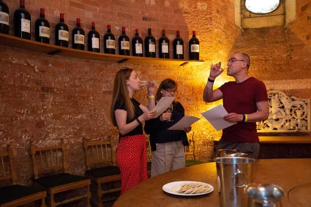 Wine tasting in the cellars © National Trust, Waddesdon Manor. (Photo Adam Hollier)