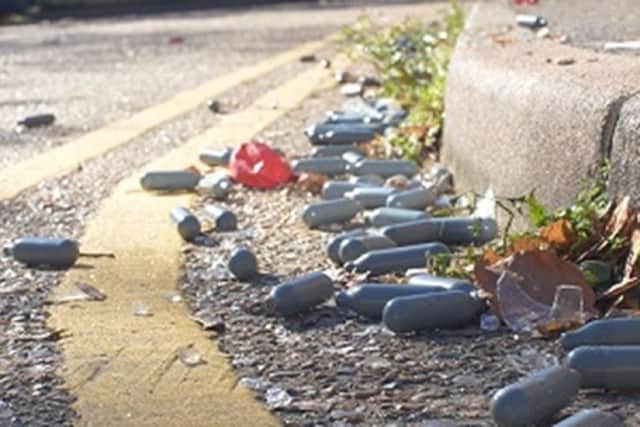 nitrous oxide containers are often seen in parks in Aylesbury, photo from Hertfordshire Constabulary