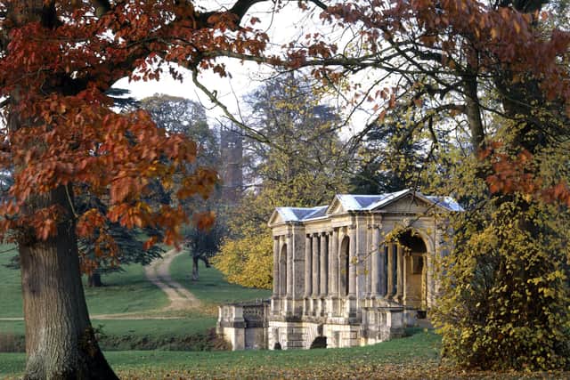 The Palladian Bridge in Stowe Landscape Gardens, surrounded by shades of autumn. The Bridge was probably built under the direction of Gibbs and was completed in 1738.
