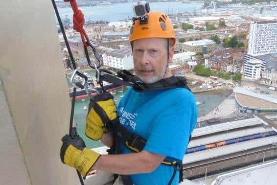 Anthony abseiling down the Spinnaker Tower in 2018
