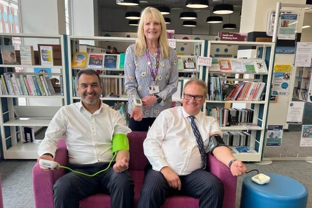 From left: Councillors Zahir Mohammed, Angela Macpherson and Clive Harriss test some of the free-to-use equipment at Aylesbury Library