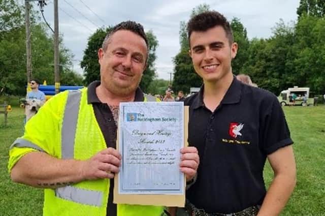 Greenspaces Team member Craig with the award