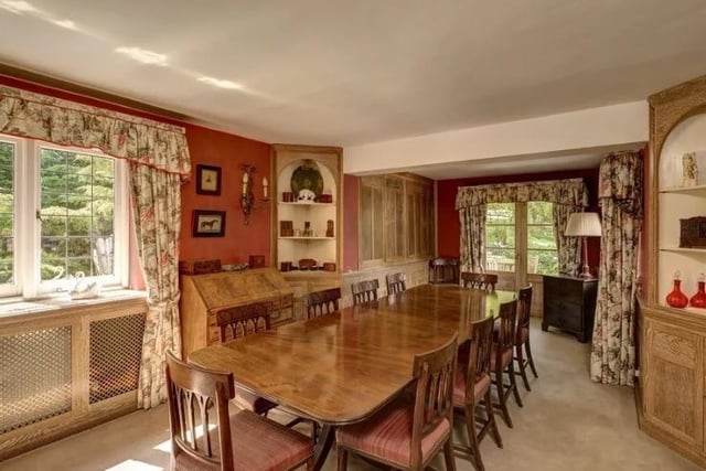 The dining room has pretty alcoves and bespoke limed oak panelling by Restall Brown & Clennell.