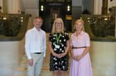 Julie Ward, deputy cabinet member for resources and town centre regeneration at Buckinghamshire Council, centre, alongside Sebastian Kemp, director of Oakford Homes and Nichola Kemp from Oakford Homes, at the official opening of the County Apartments in Aylesbury
