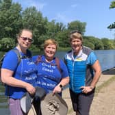 Karen Ironside and Emma Courtnadge walking along the scenic river path with Clare Balding