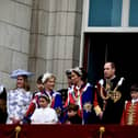 Members of the Royal family on Buckingham Palace balcony including the Prince and Princess of Wales. Image: Simon James Smith