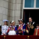 Members of the Royal family on Buckingham Palace balcony including the Prince and Princess of Wales. Image: Simon James Smith