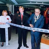 The Mayor of Aylesbury cuts the ribbon with store manager Tony Pearson, left, and Keith Edelman the new Group Chief Executive of Storehouse