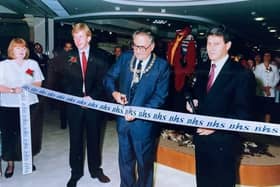 The Mayor of Aylesbury cuts the ribbon with store manager Tony Pearson, left, and Keith Edelman the new Group Chief Executive of Storehouse