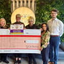 Kids Inc Nurseries and The Dream Factory holding the giant cheque for £10,632! (Left to right; Stevie Deeble, Jane Meader, Michelle Johnson, Avril Mills BEM, Alisha Patel, Tim Dickinson)