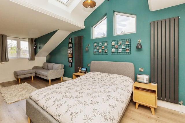 The sizeable master bedroom benefits from a modern en suite shower room