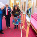 King Charles & Queen Camilla view humanitarian aid photo gallery