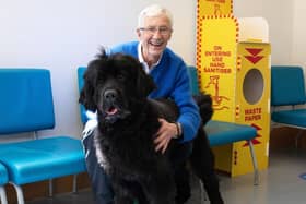 Paul O'Grady at Battersea Cats and Dogs Home with Peggy, a Newfoundland