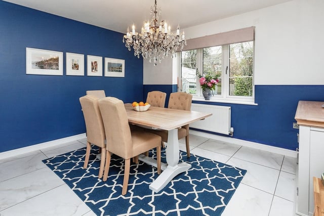 An open plan kitchen leads to the dining and separate family area.