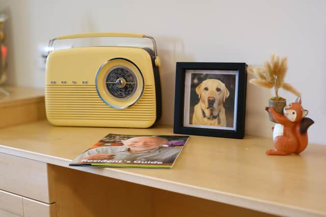 An old radio on a residents desk.