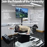Friends of the University had a go at 'virtual flying' on a tour of the AI and computing lab
