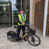 Councillor Steven Broadbent by one of the new e-bikes