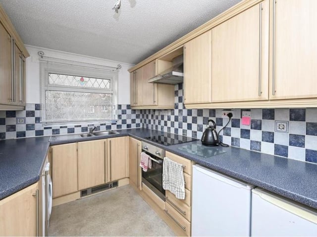 The functional kitchen has all you need, including lots of storage and worktop space.