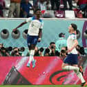 I'LL SECOND THAT: England's Bukayo Saka celebrates scoring the second goal against Group B rivals Iran with Declan Rice (right) at the Khalifa International Stadium. Picture: Nick Potts/PA