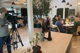 The GMB film crew at the Chatty Cafe