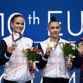 Britain's Alice Kinsella (L), Britain's Jessica Gadirova (C) and Romania's Sabrina Maneca-Voinea celebrate at the end of the Women's floor final during the 2023 Artistic Gymnastics European Championships in Antalya. (Getty Images)