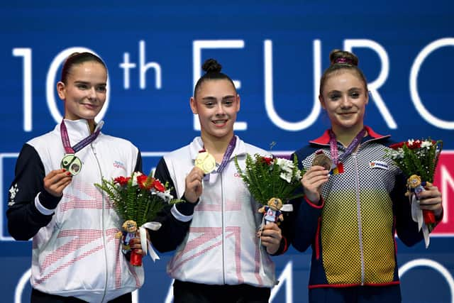 Britain's Alice Kinsella (L), Britain's Jessica Gadirova (C) and Romania's Sabrina Maneca-Voinea celebrate at the end of the Women's floor final during the 2023 Artistic Gymnastics European Championships in Antalya. (Getty Images)